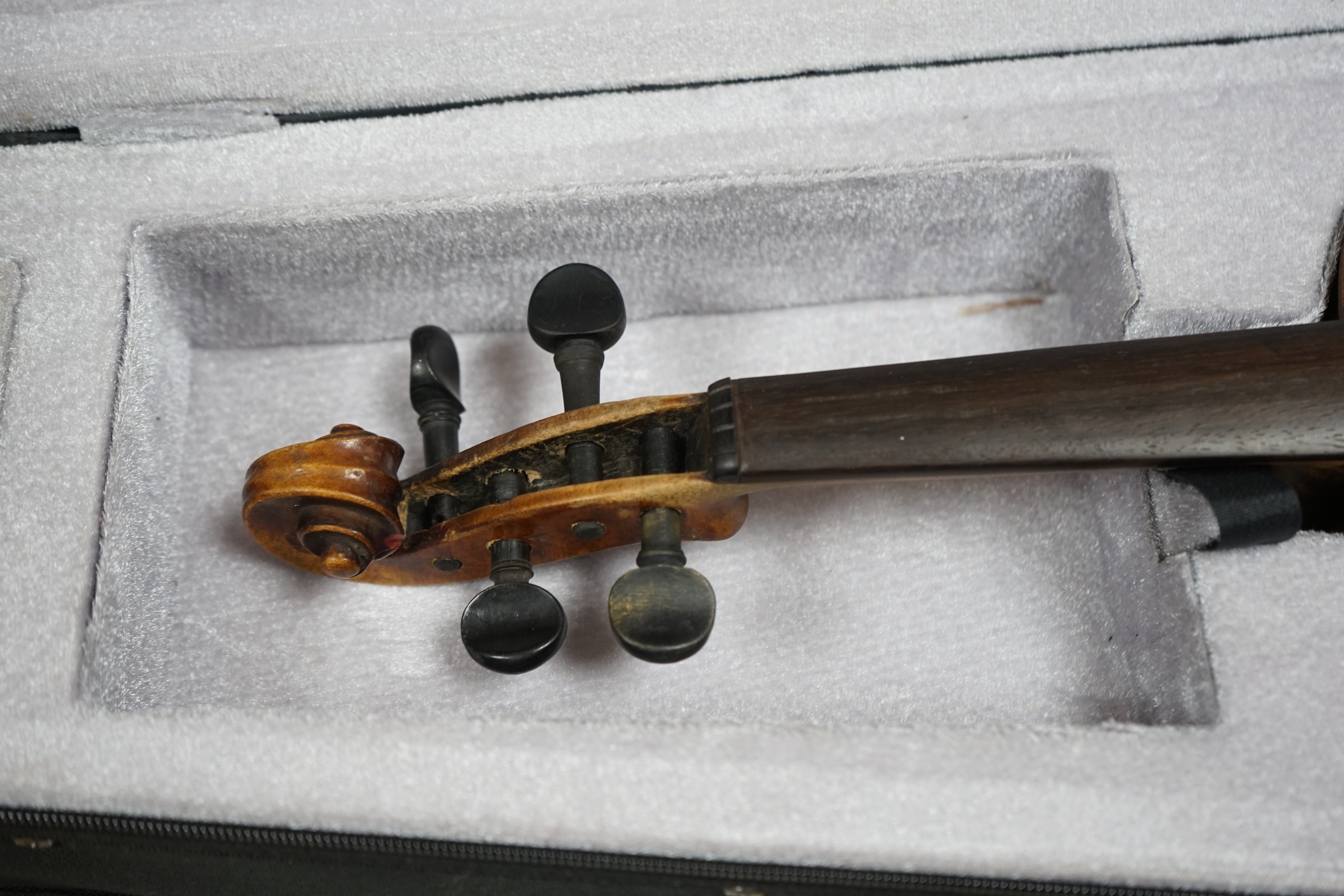 A late 19th century German violin, bears fake Stradivarius label, cased